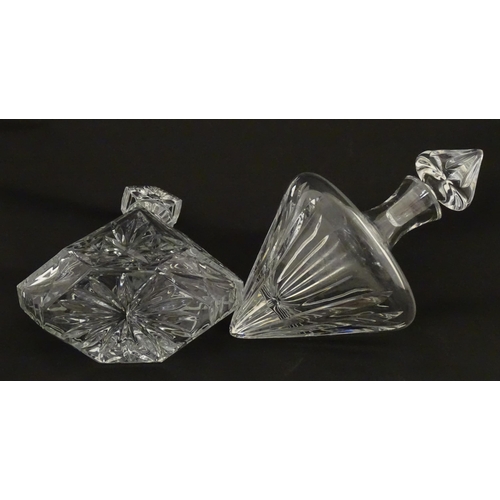 310 - A Stuart Crystal tilted decanter. Together with a Thomas Webb cut crystal decanter. Largest approx. ... 