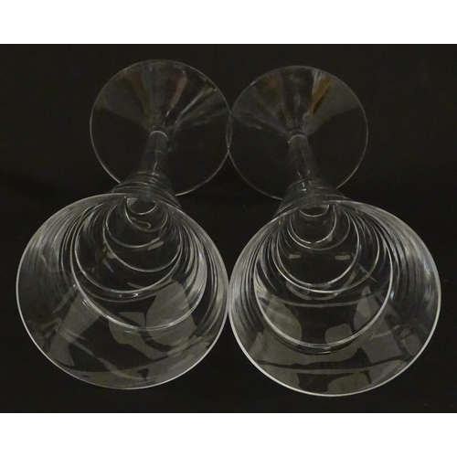 319 - A boxed pair of Jasper Conran for Stuart Crystal champagne glasses / flutes. Each approx. 10 1/4