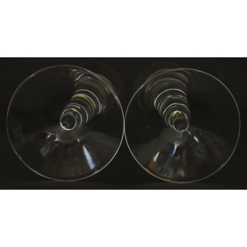 319 - A boxed pair of Jasper Conran for Stuart Crystal champagne glasses / flutes. Each approx. 10 1/4