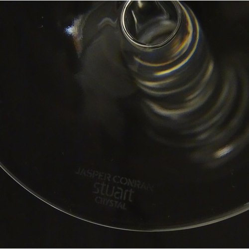 319 - A boxed pair of Jasper Conran for Stuart Crystal champagne glasses / flutes. Each approx. 10 1/4