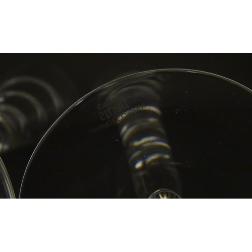 319 - A boxed pair of Jasper Conran for Stuart Crystal champagne glasses / flutes. Each approx. 10 1/4