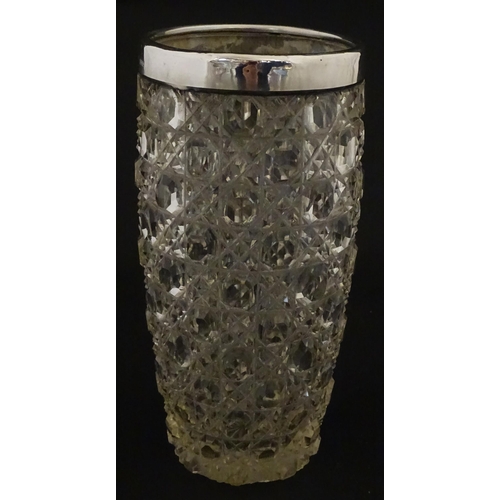 324 - A cut glass vase with silver rim hallmarked London 1902, maker Henry Perkins & Sons. Approx. 7 3/4