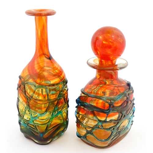 327 - Two Mdina orange glass items with blue trail detail comprising bottle vase and decanter. Largest app... 
