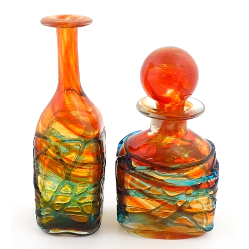 327 - Two Mdina orange glass items with blue trail detail comprising bottle vase and decanter. Largest app... 