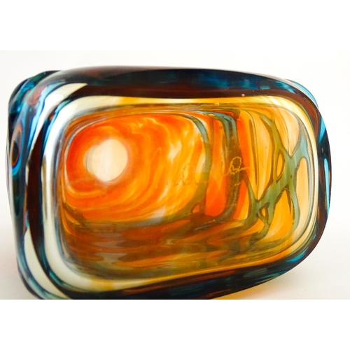 327 - Two Mdina orange glass items with blue trail detail comprising bottle vase and decanter. Largest app... 