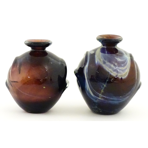 329 - Two Mdina glass Pulled Ear vases. One signed Mdina under. Largest approx. 6