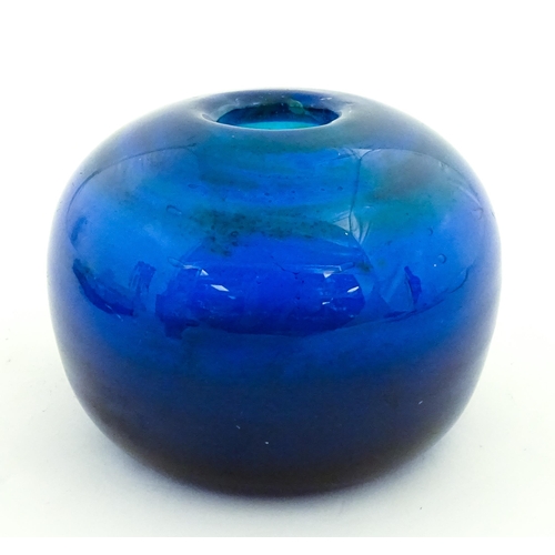 334 - A Mdina blue glass inside out vase of squat form. Approx. 3 1/2