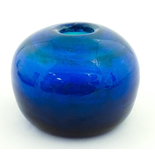 334 - A Mdina blue glass inside out vase of squat form. Approx. 3 1/2