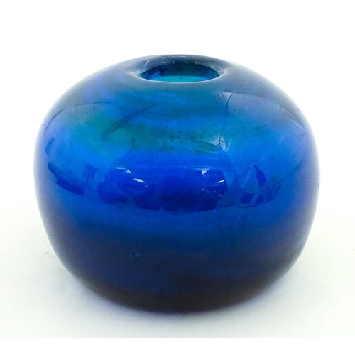334 - A Mdina blue glass inside out vase of squat form. Approx. 3 1/2