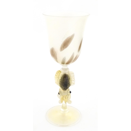 338 - An Italian Maria Grazia Rosin 'Cuttlefish' blown glass wine glass with fish detail to stem. Boxed. A... 