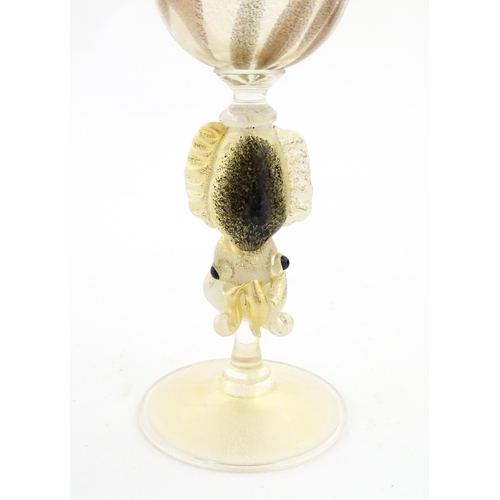338 - An Italian Maria Grazia Rosin 'Cuttlefish' blown glass wine glass with fish detail to stem. Boxed. A... 