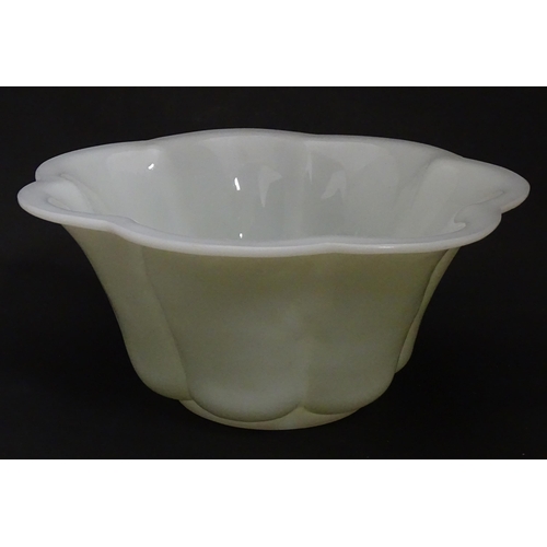339 - A Chinese Peking glass bowl of lobed flower form. Approx. 10 1/4