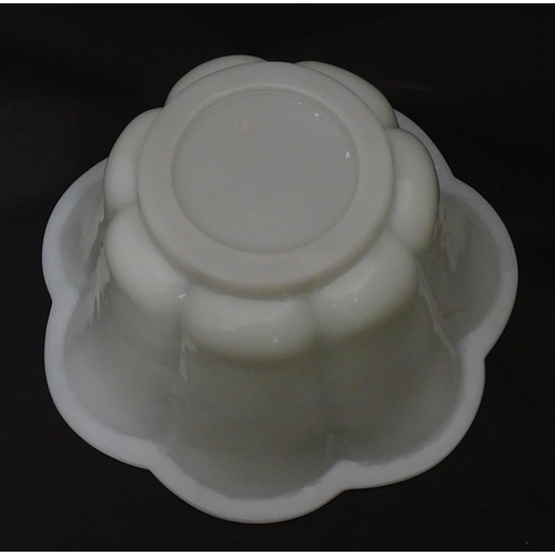 339 - A Chinese Peking glass bowl of lobed flower form. Approx. 10 1/4