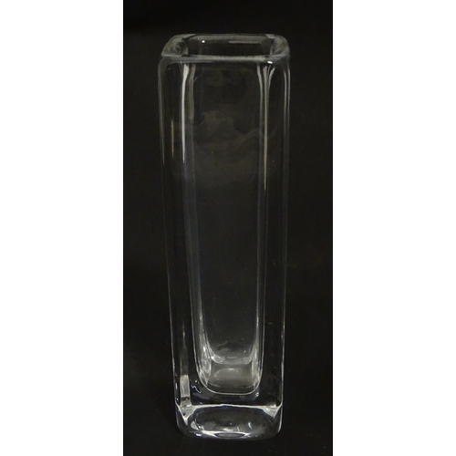 340 - A Swedish Orrefors glass vase of squared form. Signed under. Approx. 9