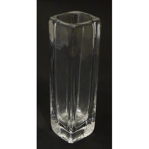 340 - A Swedish Orrefors glass vase of squared form. Signed under. Approx. 9