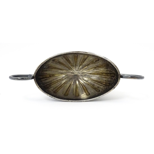 345 - A silver twin handled pedestal salt. Hallmarked Chester 1897 maker Florence Warden. Approx 4