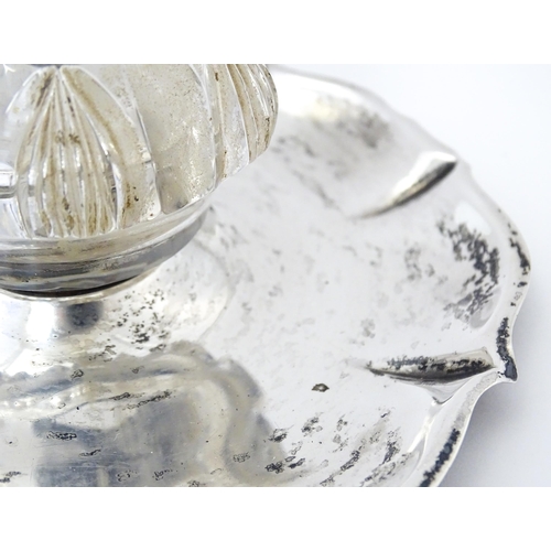 346 - A Victorian cut glass inkwell on silver stand and with silver mounts and lid. Hallmarked London 1900... 