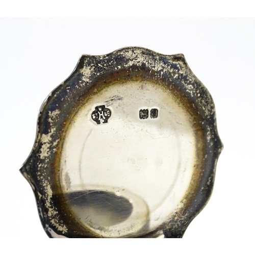 346 - A Victorian cut glass inkwell on silver stand and with silver mounts and lid. Hallmarked London 1900... 