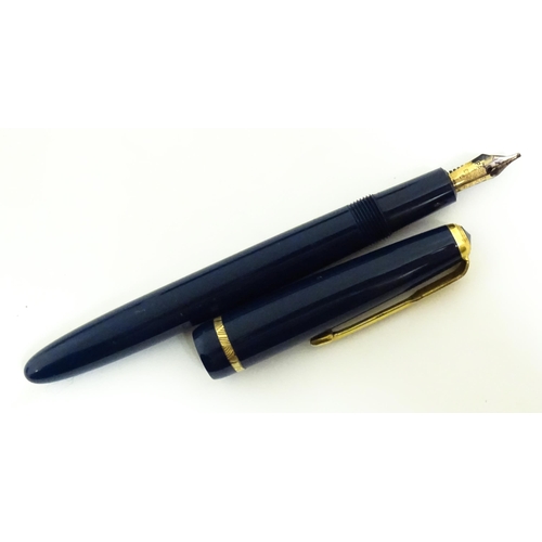 1139 - A cased Conway Stewart '107' set comprising fountain pen with 14k gold nib, and ballpoint pen. Toget... 