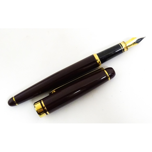 1139 - A cased Conway Stewart '107' set comprising fountain pen with 14k gold nib, and ballpoint pen. Toget... 