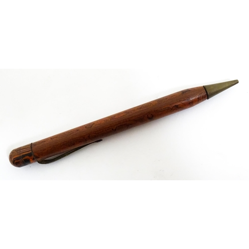 1140A - A Mentmore fountain pen with 14k gold nib and green celluloid finish. Together with a Bakelite prope... 
