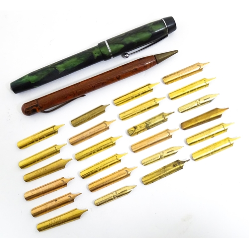 1140A - A Mentmore fountain pen with 14k gold nib and green celluloid finish. Together with a Bakelite prope... 