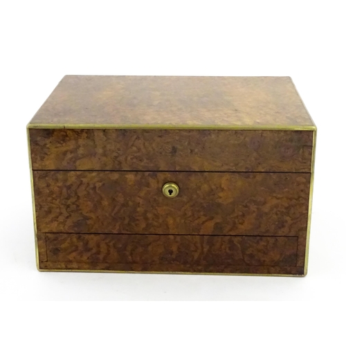 1142 - A Victorian brass bound walnut travelling vanity case / box with sprung section lower and to side, o... 