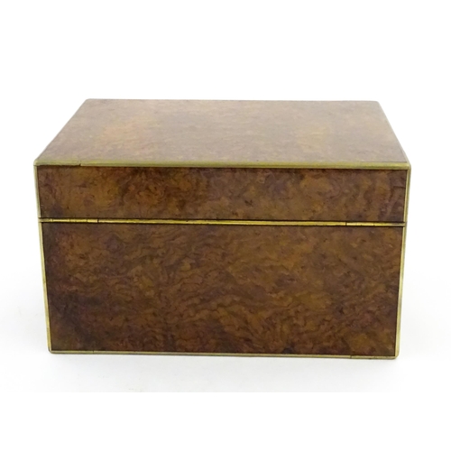 1142 - A Victorian brass bound walnut travelling vanity case / box with sprung section lower and to side, o... 