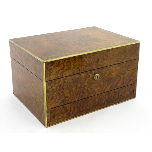 1142 - A Victorian brass bound walnut travelling vanity case / box with sprung section lower and to side, o... 