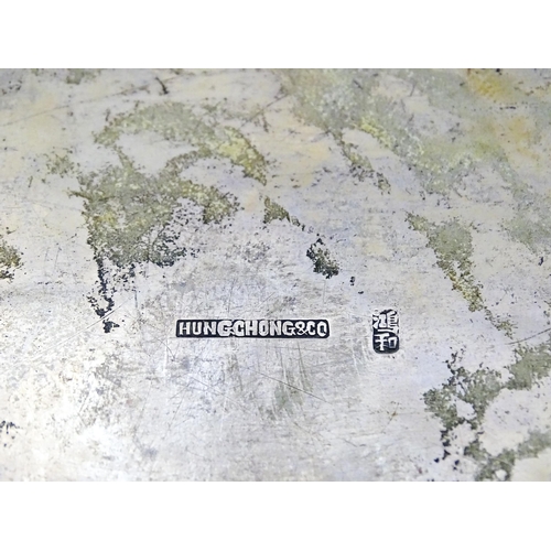 343 - A Chinese export white metal box with bamboo decoration and opening to reveal a gilded two sectional... 