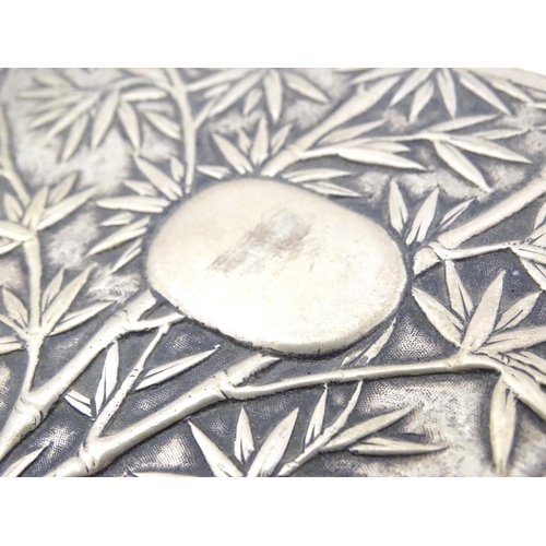 343 - A Chinese export white metal box with bamboo decoration and opening to reveal a gilded two sectional... 