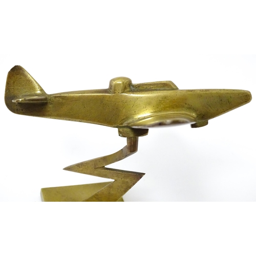 1189 - Militaria : a brass Trenchart desk model aeroplane formed as a Boulton Paul Defiant interceptor. Sup... 