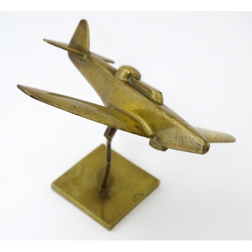 1189 - Militaria : a brass Trenchart desk model aeroplane formed as a Boulton Paul Defiant interceptor. Sup... 