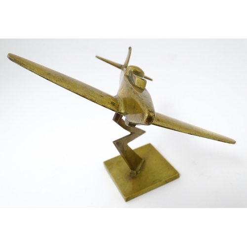 1189 - Militaria : a brass Trenchart desk model aeroplane formed as a Boulton Paul Defiant interceptor. Sup... 