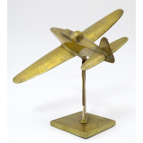 1189 - Militaria : a brass Trenchart desk model aeroplane formed as a Boulton Paul Defiant interceptor. Sup... 