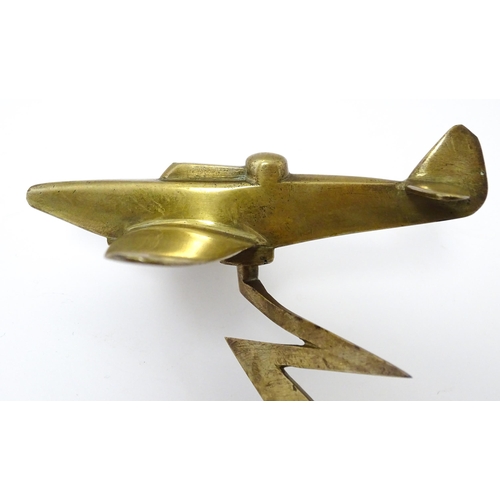 1189 - Militaria : a brass Trenchart desk model aeroplane formed as a Boulton Paul Defiant interceptor. Sup... 