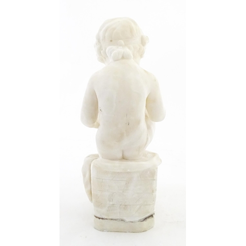1224 - An Italian alabaster sculpture modelled as a seated child reading a book, after C. Ghilli. Approx. 1... 