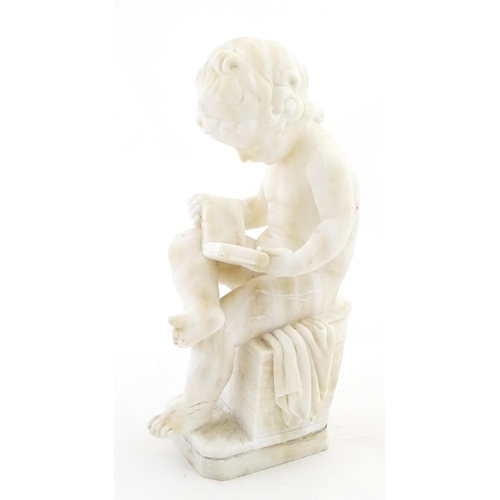 1224 - An Italian alabaster sculpture modelled as a seated child reading a book, after C. Ghilli. Approx. 1... 