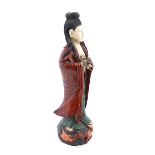 1270 - A large Chinese carved wooden sculpture modelled as Guanyin, with polychrome decoration. Approx. 29 ... 
