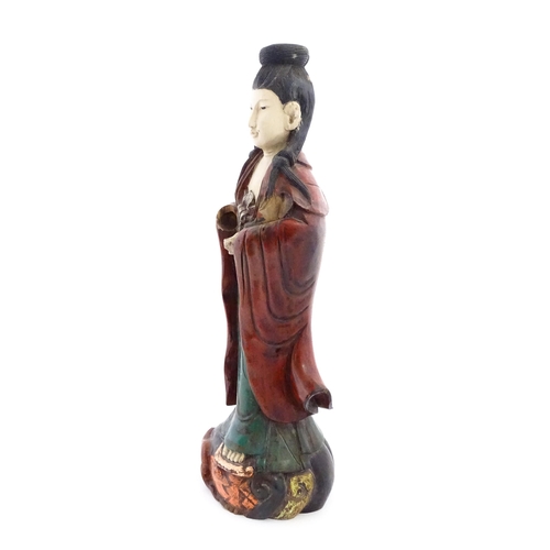 1270 - A large Chinese carved wooden sculpture modelled as Guanyin, with polychrome decoration. Approx. 29 ... 