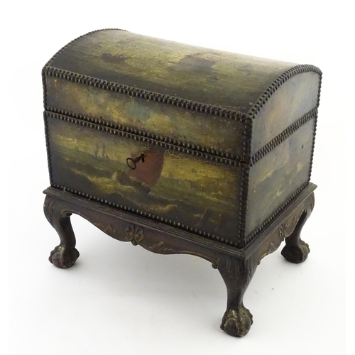 1166 - A domed chest on stand / trunk with painted decoration depicting ships at sea, and stud detail. Appr... 