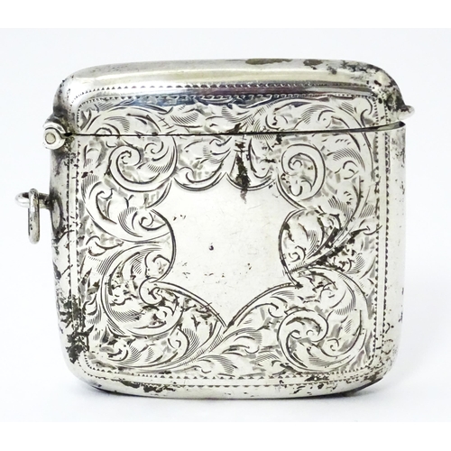 352 - A large silver vesta case with engraved acanthus scroll decoration, hallmarked Birmingham 1921, make... 