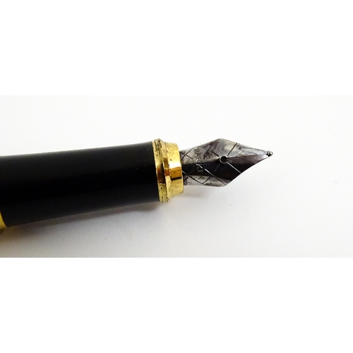 1140 - A Parker, France '75' fountain pen with 14k gold nib and 'IIIA' date mark (1992), together with a Pa... 