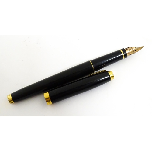 1140 - A Parker, France '75' fountain pen with 14k gold nib and 'IIIA' date mark (1992), together with a Pa... 