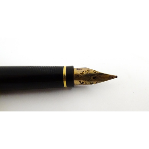 1140 - A Parker, France '75' fountain pen with 14k gold nib and 'IIIA' date mark (1992), together with a Pa... 