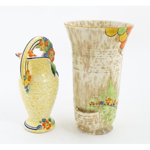 206 - A Bewley Pottery Art Deco vase of flared form with hand painted landscape decoration, in the manner ... 