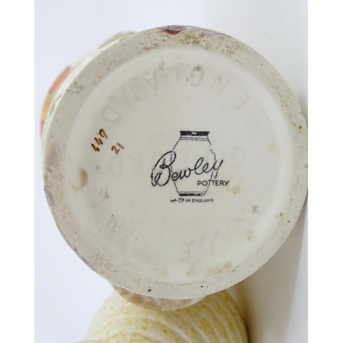 206 - A Bewley Pottery Art Deco vase of flared form with hand painted landscape decoration, in the manner ... 