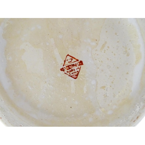 65 - A large Chinese vase decorated with birds and flowers. Marked under. Approx. 24