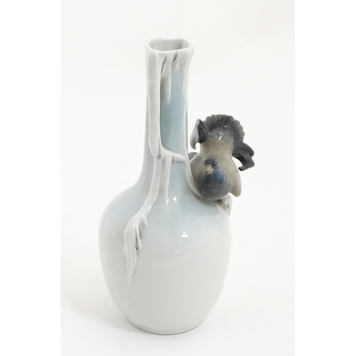 88A - A German Metzler & Ortloff vase with capercaillie bird detail. Approx. 8 3/4