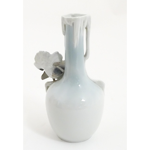 88A - A German Metzler & Ortloff vase with capercaillie bird detail. Approx. 8 3/4